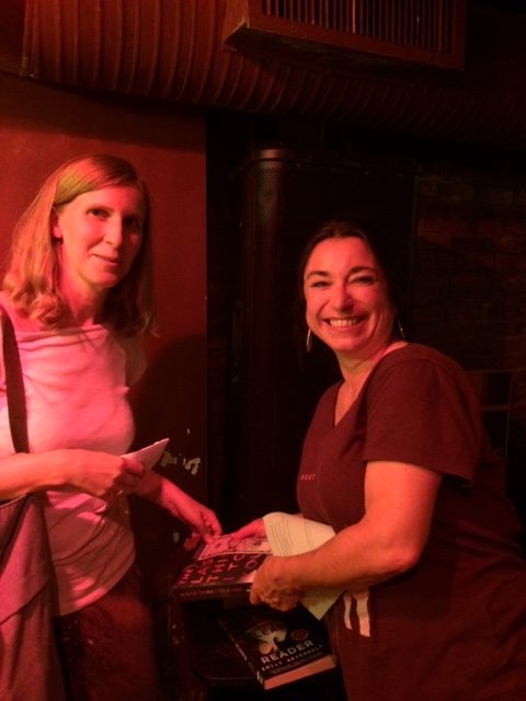 This is our Featured Reader (left) Emily Arsenault, selling one of her books to SD member Lanette Sweeney.